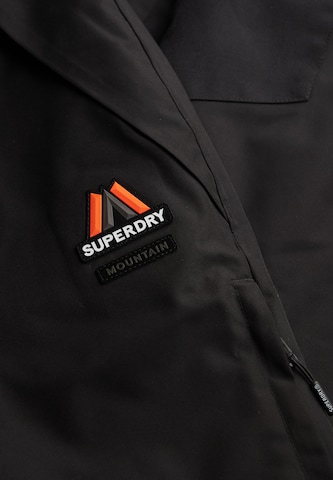 Superdry & Co Regular Funktionshose in Schwarz