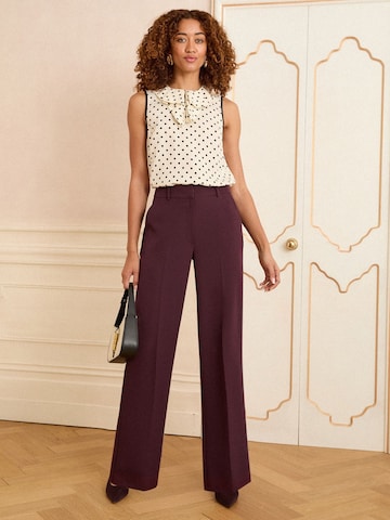 Wide leg Pantaloni con piega frontale di love & roses in rosso