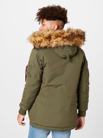 ALPHA INDUSTRIES Winter Jacket 'Arctic Discoverer' in Green