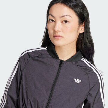 ADIDAS ORIGINALS Φθινοπωρινό και ανοιξιάτικο μπουφάν 'Adicolor Teamgeist' σε μαύρο