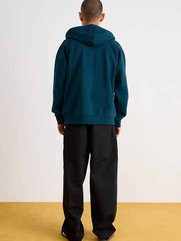 Wide leg Pantaloni con pieghe 'Merrick' di Carhartt WIP in nero