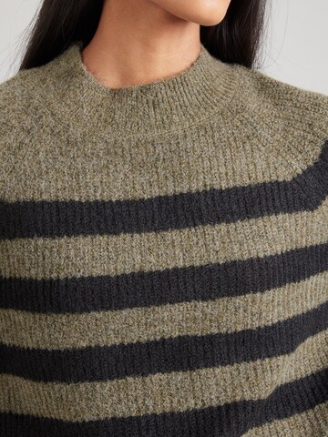 zaļš QS Džemperis