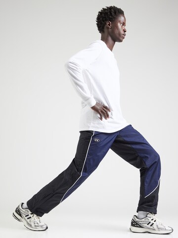 Regular Pantalon de sport UNDER ARMOUR en bleu