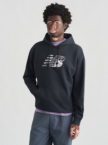Sweat-shirt new balance en noir : devant