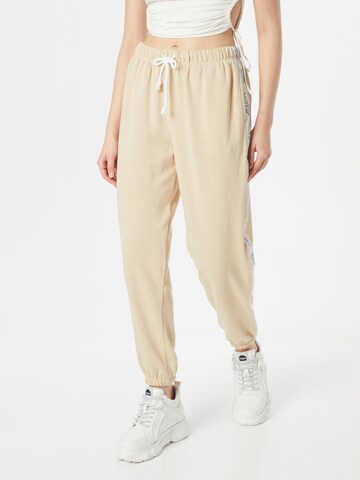 LEVI'S ® Tapered Pants 'Graphic Laundry Sweatpant' in Beige: front