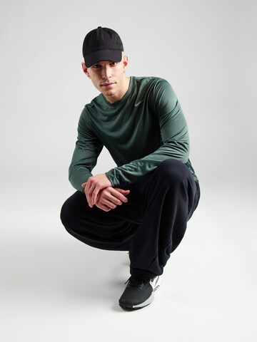 NIKE - Camiseta funcional en verde