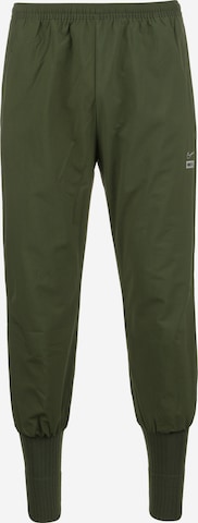 NIKE Tapered Sportbroek in Groen: voorkant