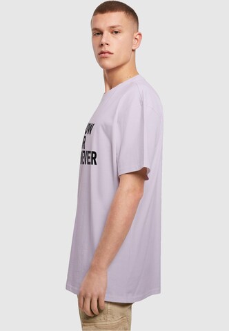 T-Shirt 'Now Or Never' Merchcode en violet