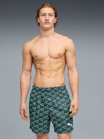 regular Pantaloni sportivi 'Puma Swim Men Printed Flag Mid Shorts 1p' di PUMA in blu