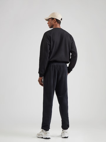 ELLESSE Tapered Broek 'Pideura' in Zwart