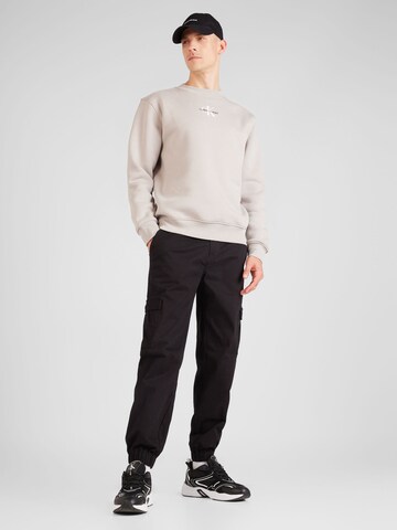 Calvin Klein Jeans Sweatshirt in Beige