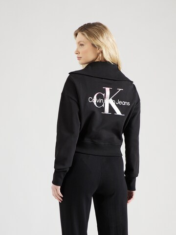 Calvin Klein Jeans Sweatjacka i svart: framsida