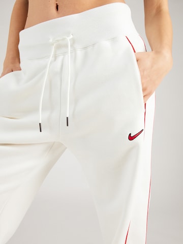 Wide leg Pantaloni 'FLC PHX' de la Nike Sportswear pe bej