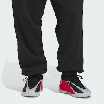 ADIDAS PERFORMANCE - Tapered Pantalón deportivo 'Anthony Edwards Foundation' en negro