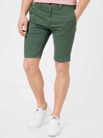 Regular Pantalon chino 'Scanton' Tommy Jeans en vert : devant