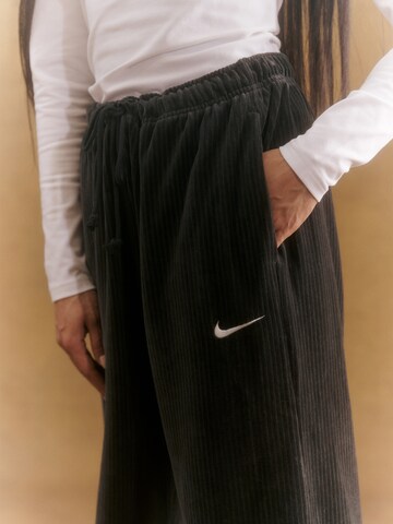 Nike Sportswear Дънки Tapered Leg Панталон в черно