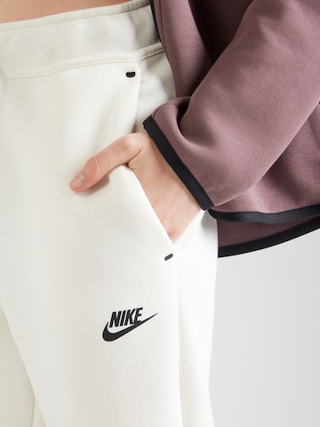 Nike Sportswear Tapered Trousers 'TCH FLC' in Beige