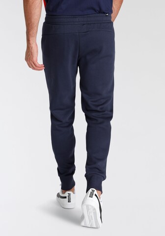 PUMA Tapered Sportbroek in Blauw