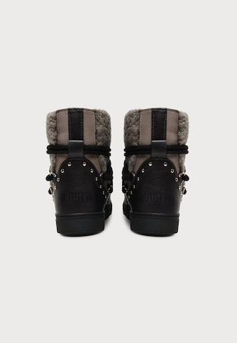 Après-ski 'CURLY ROCK' INUIKII en gris