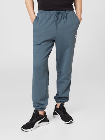 PUMA Tapered Pants in Blue: front