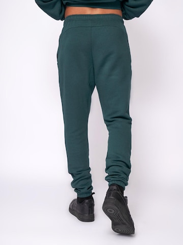 Fortex Fitness Slimfit Sportbroek 'Essential Jogger' in Groen