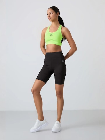 Haut de sport Tommy Life en vert