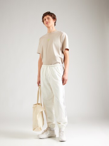 Nike Sportswear Tapered Byxa i vit