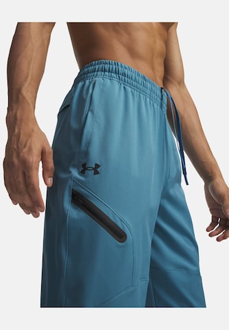 UNDER ARMOUR Tapered Sportbroek 'Unstoppable' in Blauw