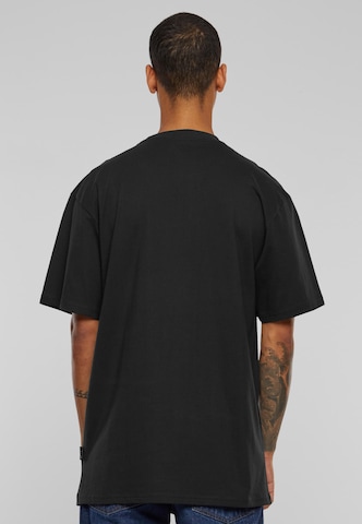 Karl Kani T-Shirt in Schwarz