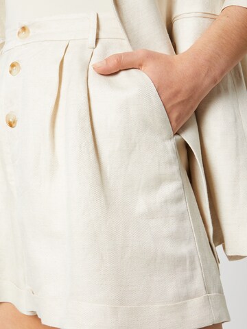 Guido Maria Kretschmer Women - Loosefit Pantalón plisado 'Marina' en beige