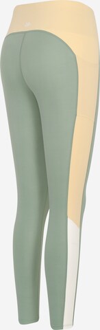 Yvette Sports Kitsas Spordipüksid 'Carly', värv roheline