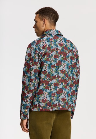 Shiwi Tussenjas 'Ian' in Blauw