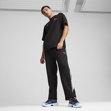 PUMA Functioneel shirt 'Neon Energy' in Zwart