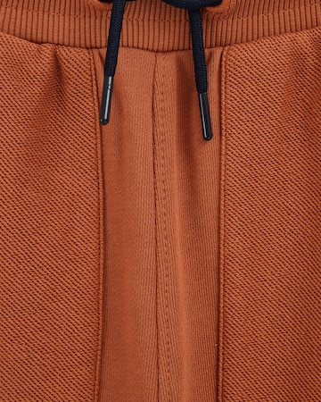 regular Pantaloni di WE Fashion in arancione