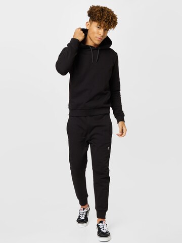 BRUNOTTISportska sweater majica 'Patcher' - crna boja