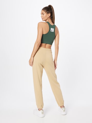 ELLESSE Tapered Broek 'Jeva' in Bruin