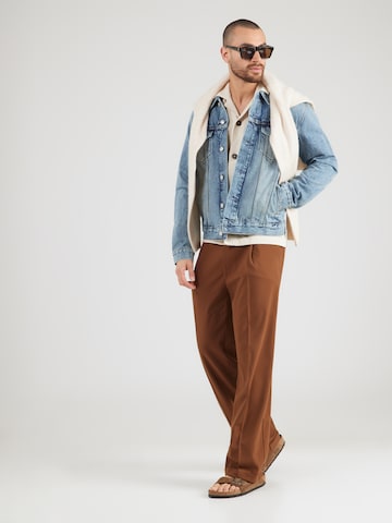 Calvin Klein Jeans Prehodna jakna 'ANDREW' | modra barva