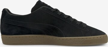 Baskets basses PUMA en noir