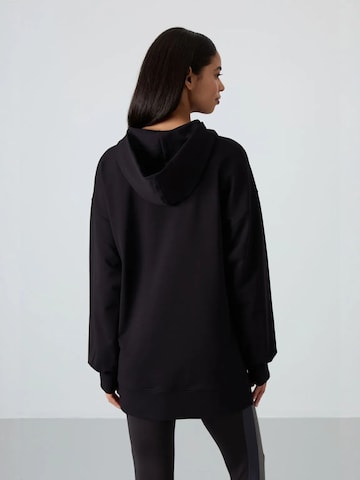 Sweat-shirt Tommy Life en noir