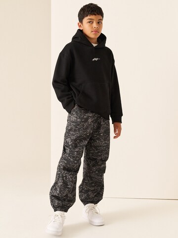 Next - Tapered Pantalón en negro
