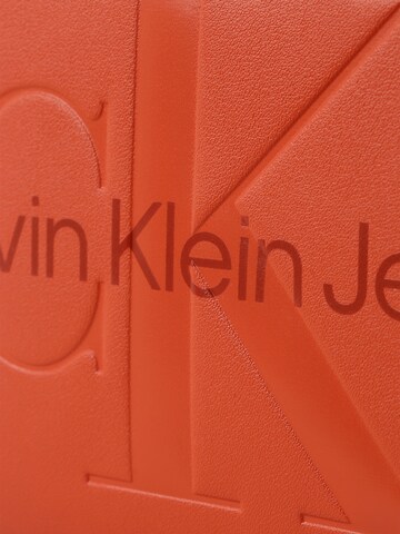 Calvin Klein Jeans Schoudertas in Oranje