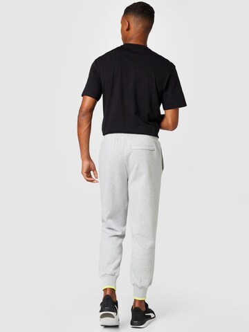 PUMA Tapered Trousers in Grey