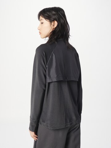 new balance Sportshirt 'Speed Layer' in Schwarz