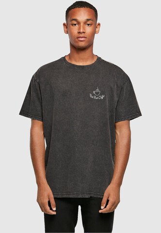 Merchcode Shirt 'But First Coffee' in Zwart: voorkant