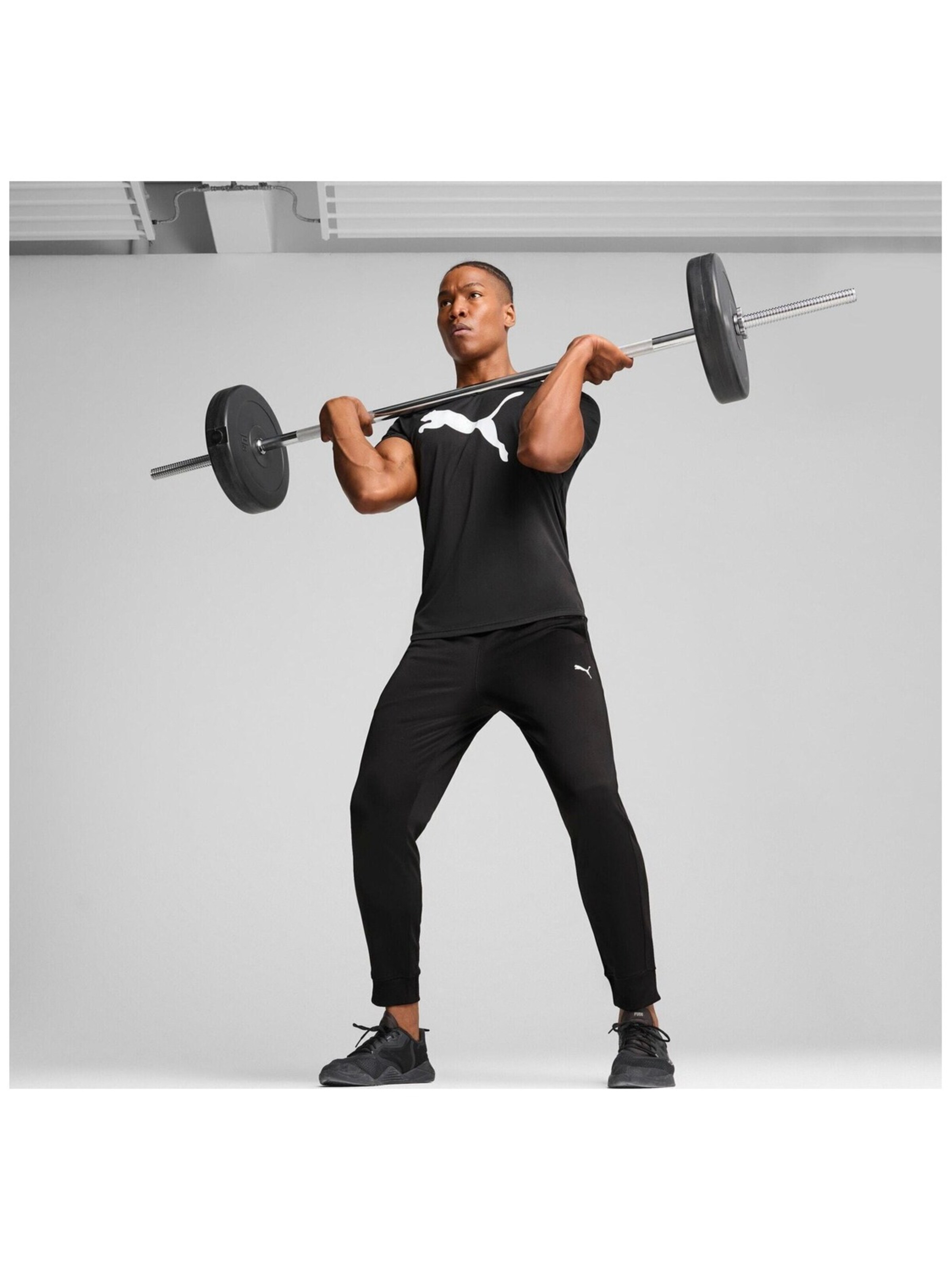 Maglietta 'Puma M Tad Essentials Solid Cat Tee' di PUMA in nero