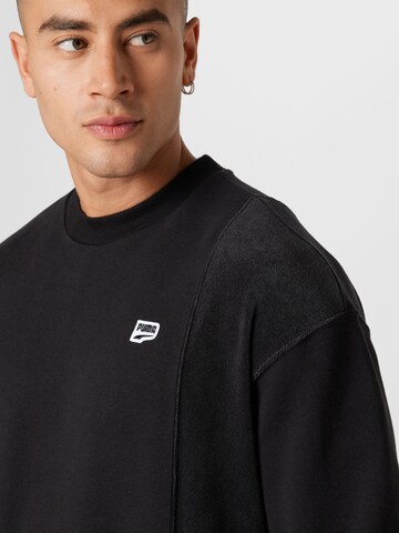 PUMA Sweatshirt in Schwarz