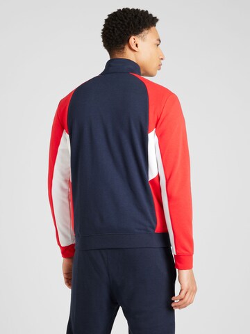 Champion Authentic Athletic Apparel Tracksuit in Blue