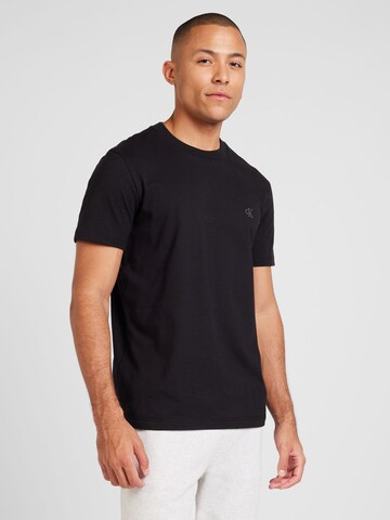Calvin Klein Jeans - Camiseta en negro: frente