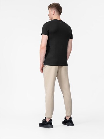 Largi Pantaloni sport de la 4F pe bej