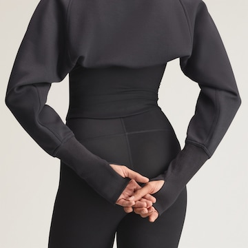 Bluză cu fermoar sport 'Studio' de la ADIDAS BY STELLA MCCARTNEY pe negru